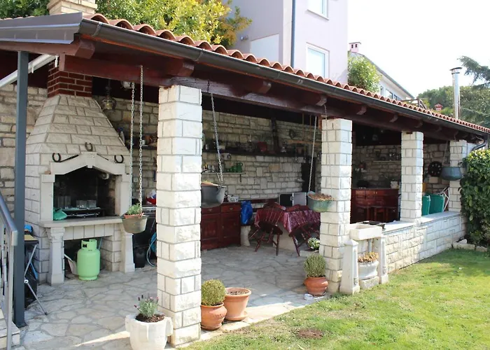 アパート Aria Superior Apartment, Seaview & Wellness ポルトローシュ